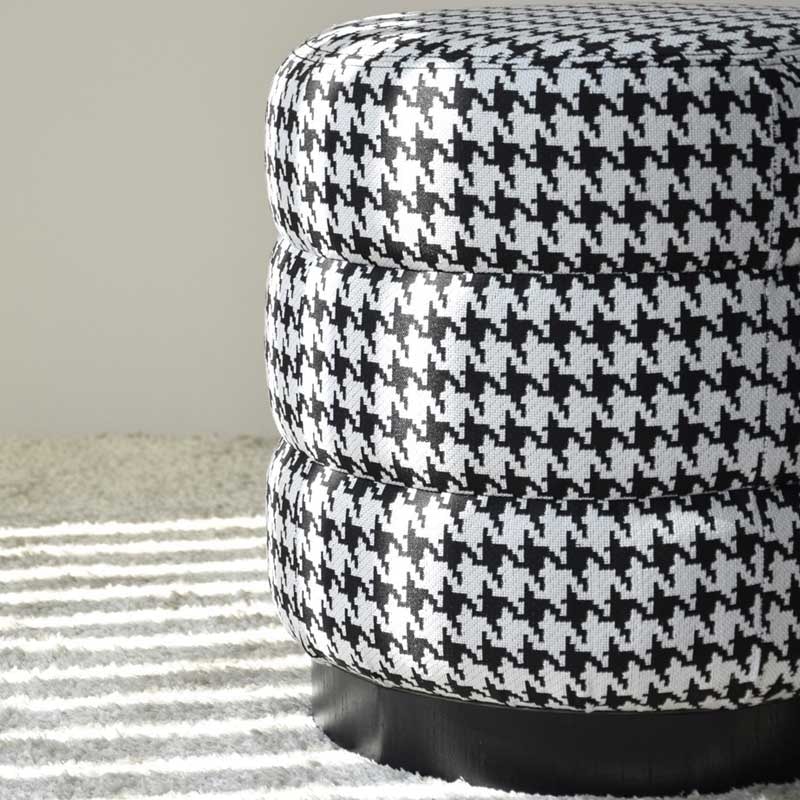Pouf in upholstered in houndstooth white black